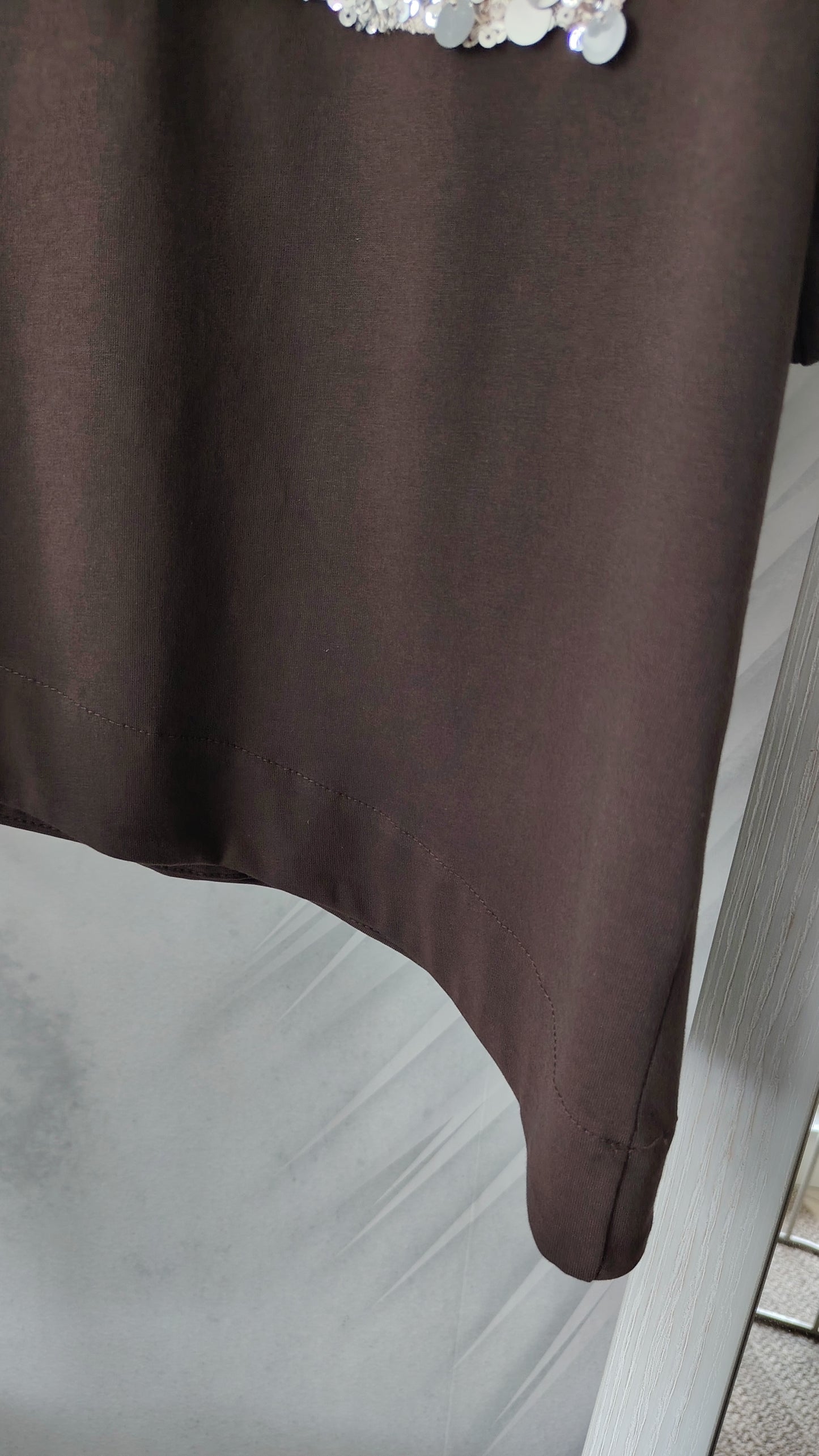 T-shirt con tasca paillettes