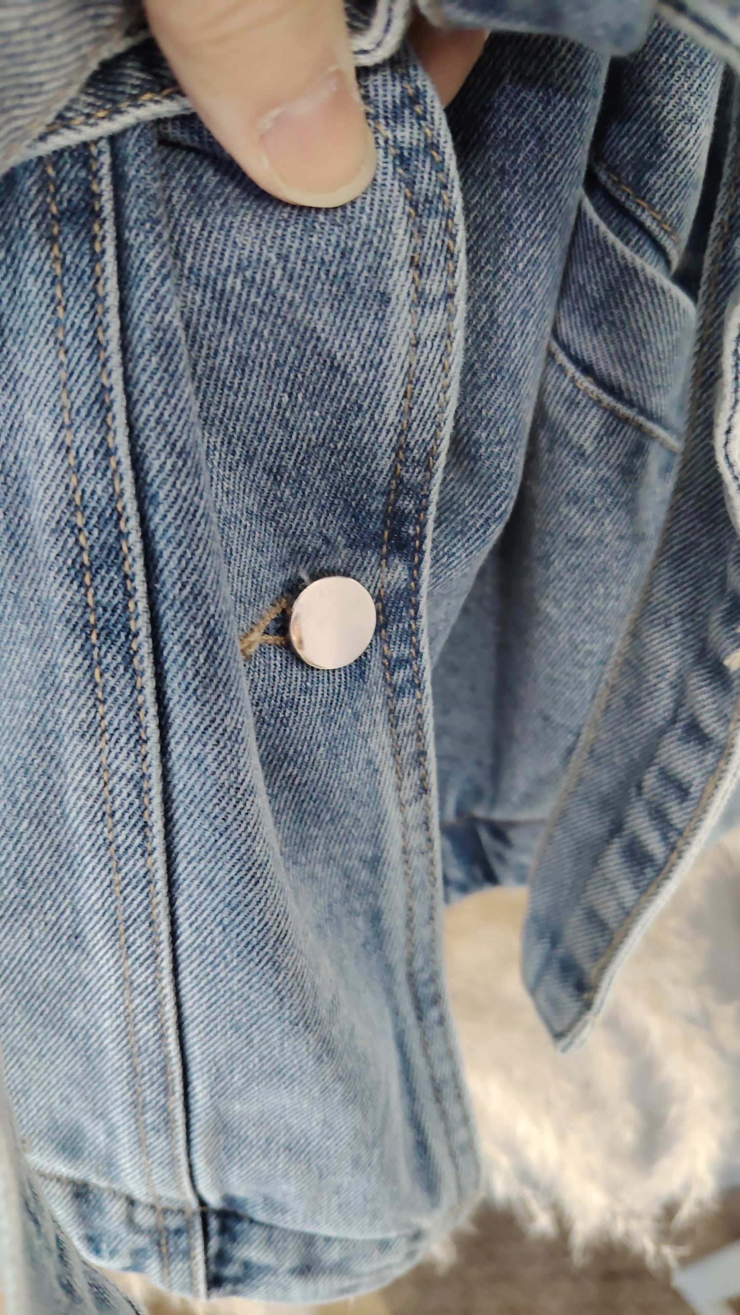 Giubbotto in denim con cintura