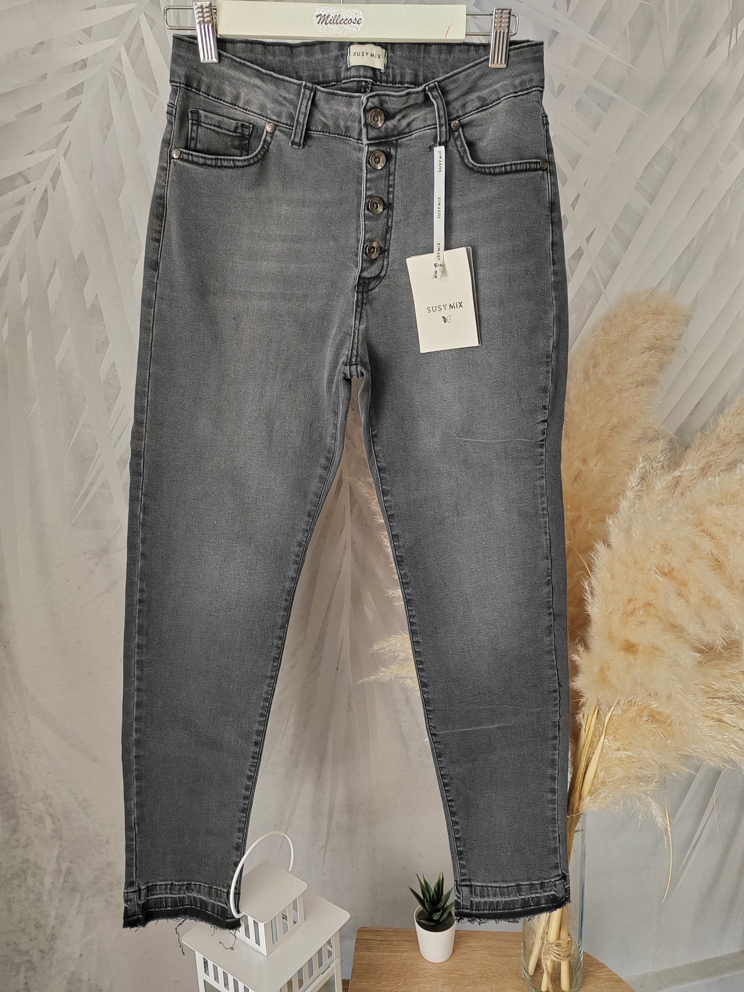 Jeans skinny bottoni a vista