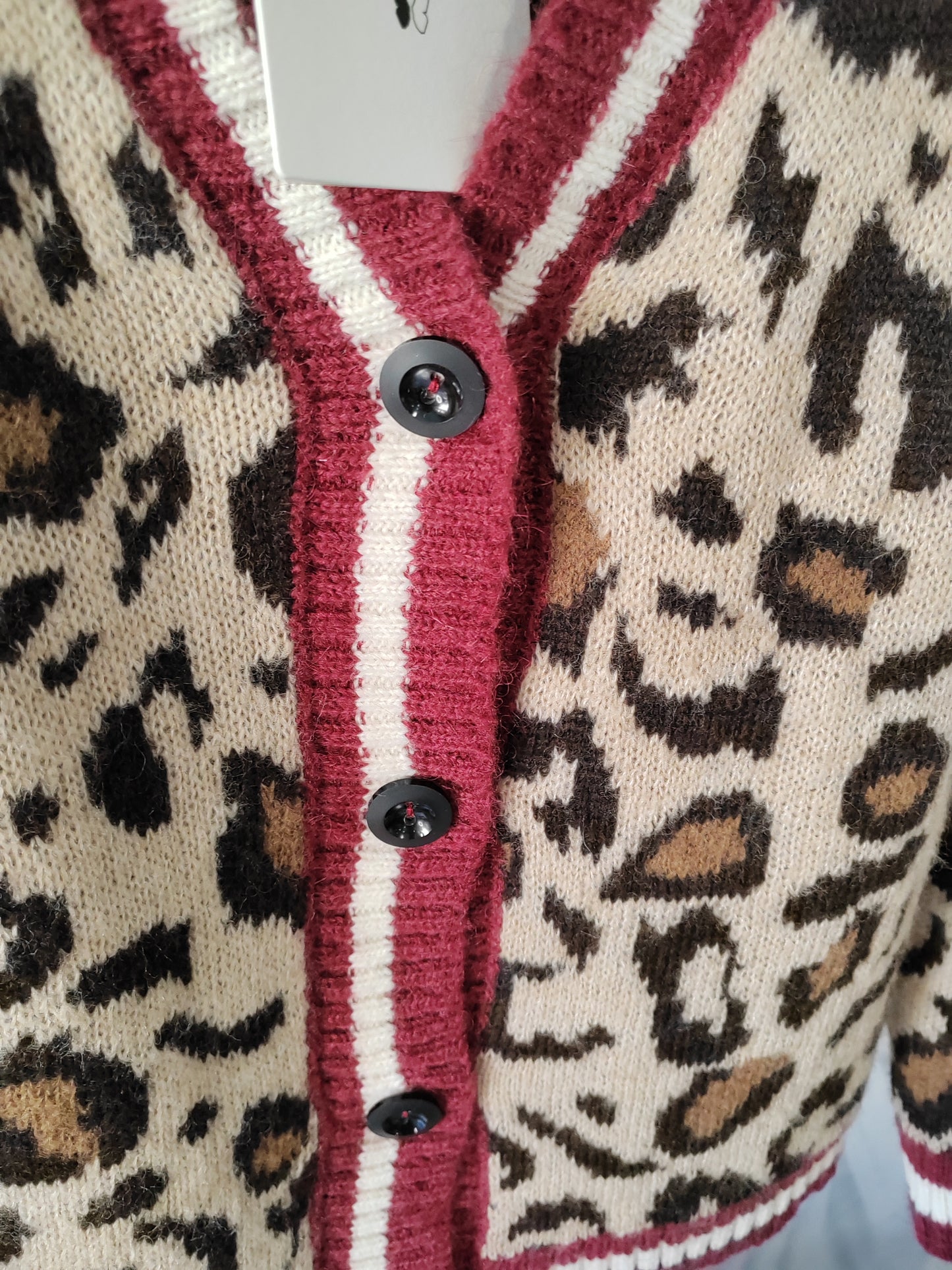 Cardigan maculato bordo a contrasto