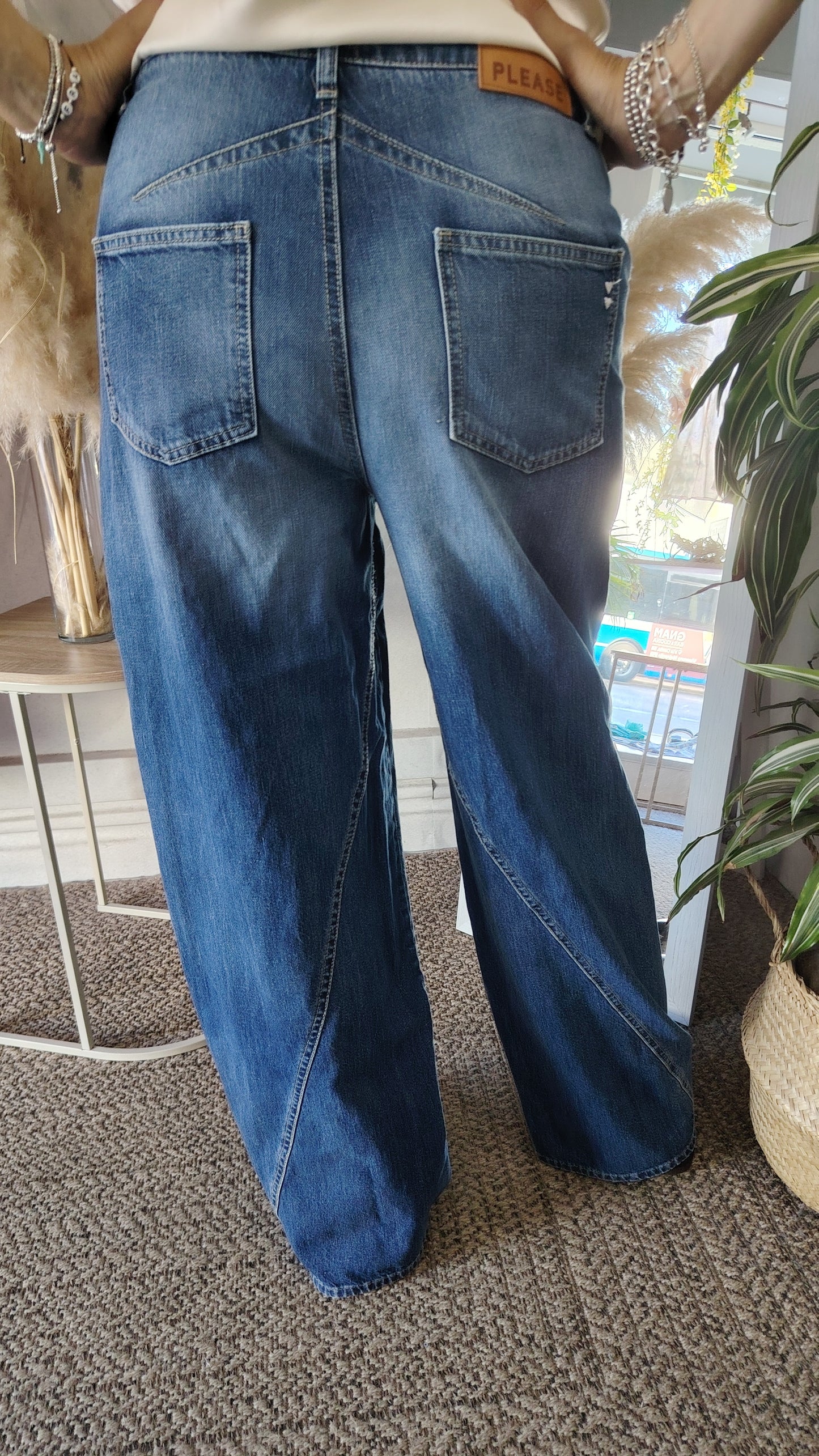 Jeans abbottonatura asimmetrica