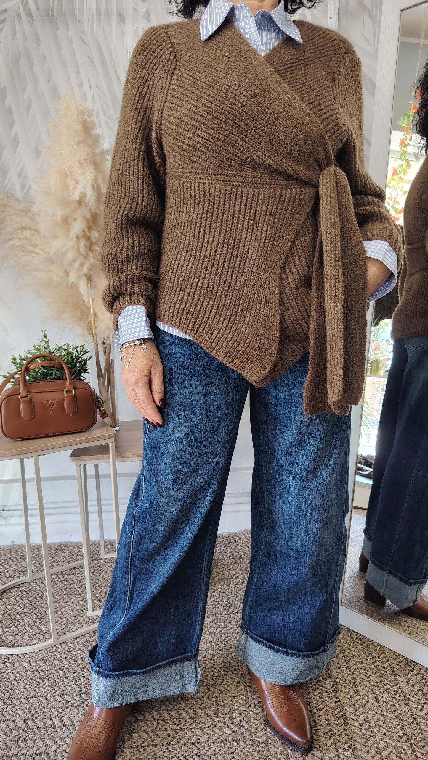 Jeans gamba larga con risvolto alto