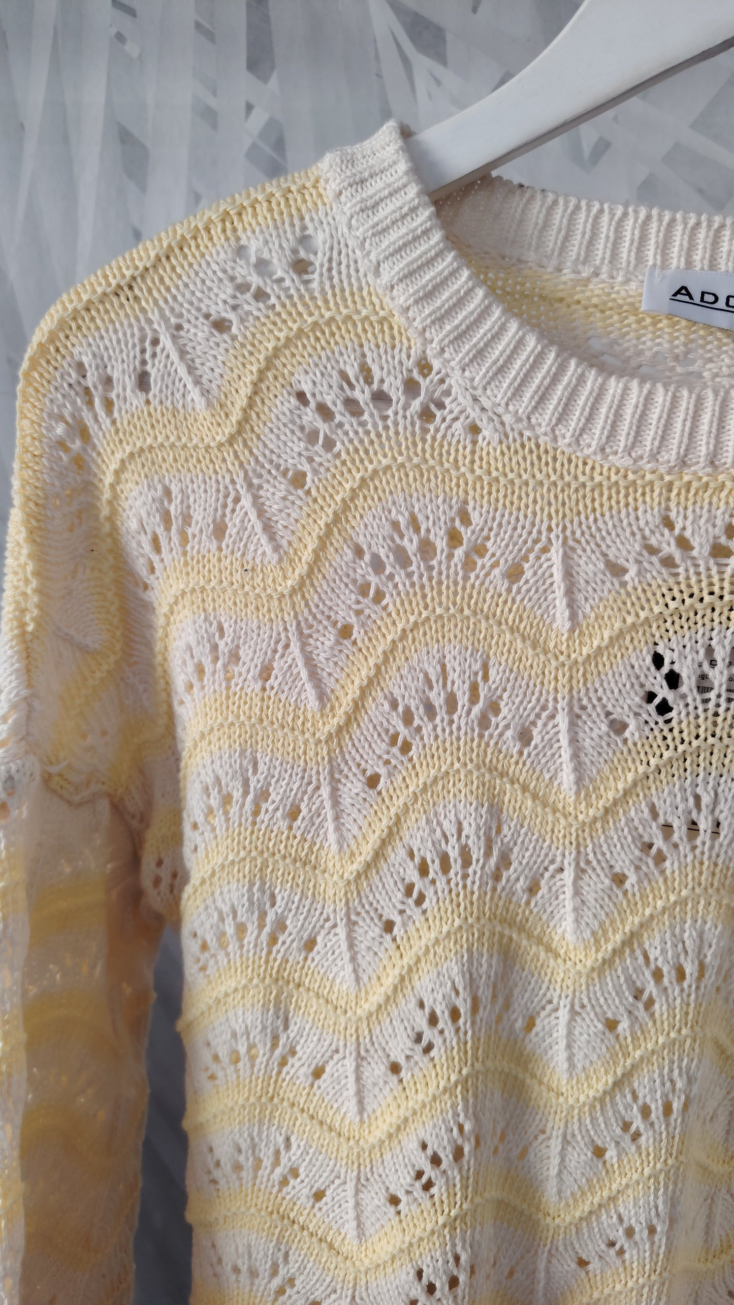 Pull punto pavone bicolore