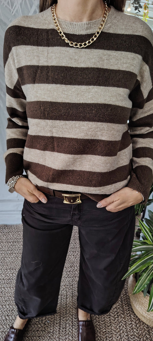 Pull righe bottoni polso