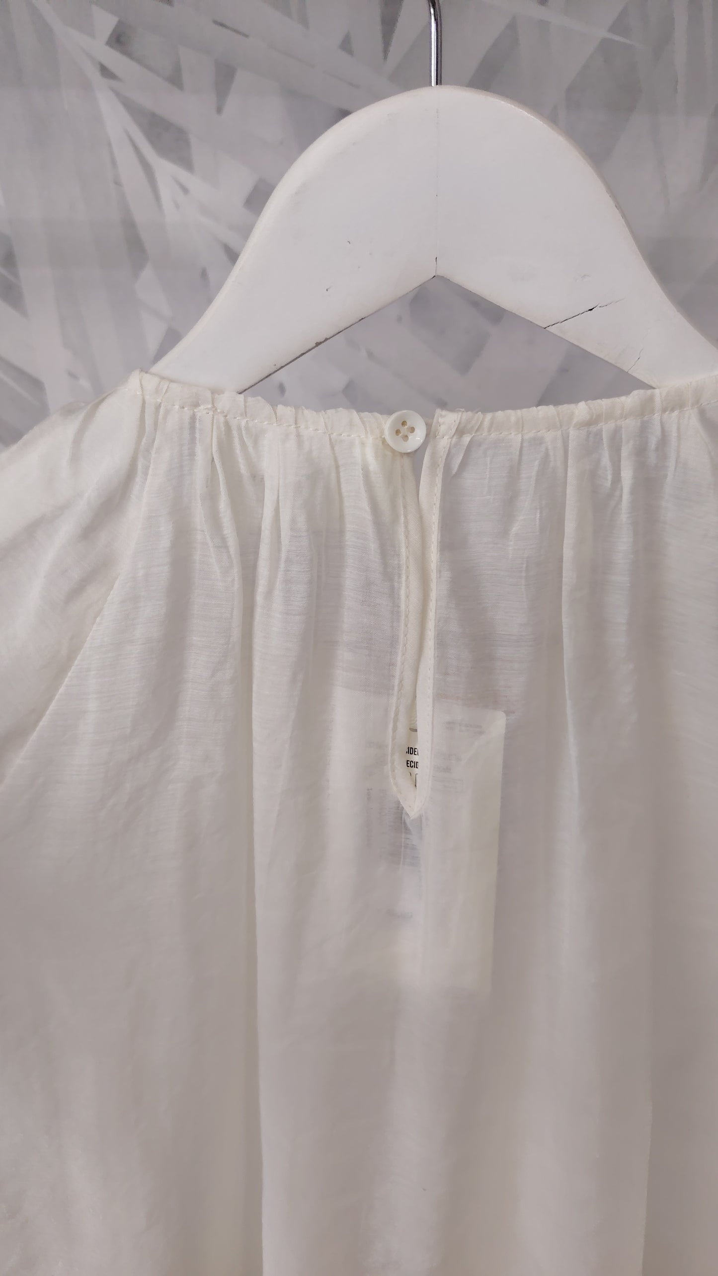 Blusa con dettaglio oro