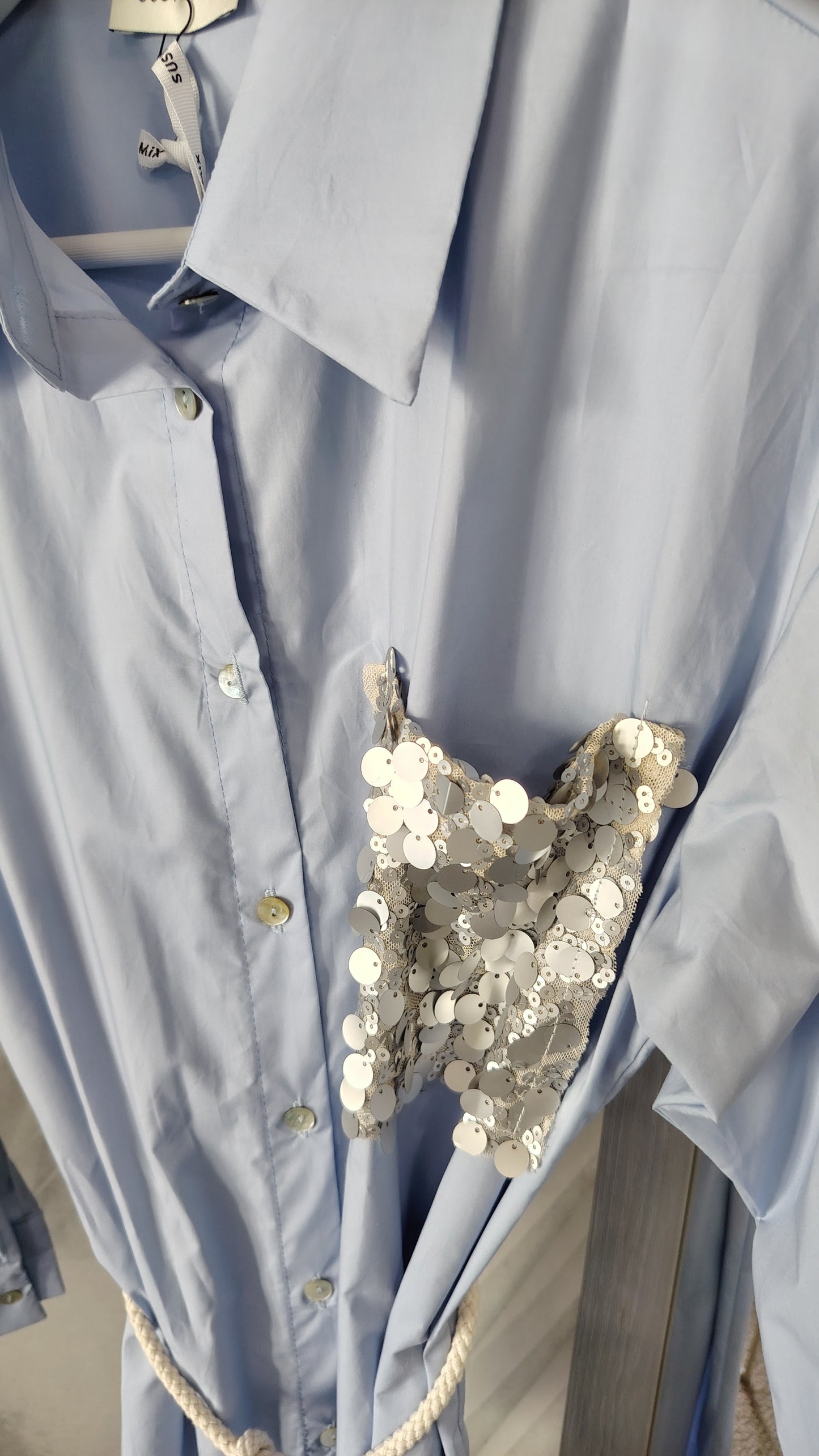 Maxi camicia con tasca paillettes