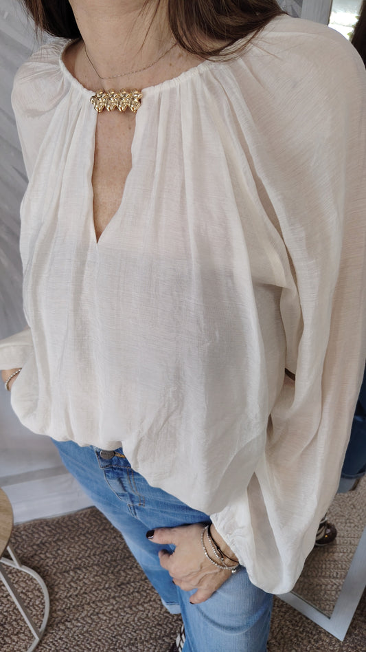 Blusa con dettaglio oro