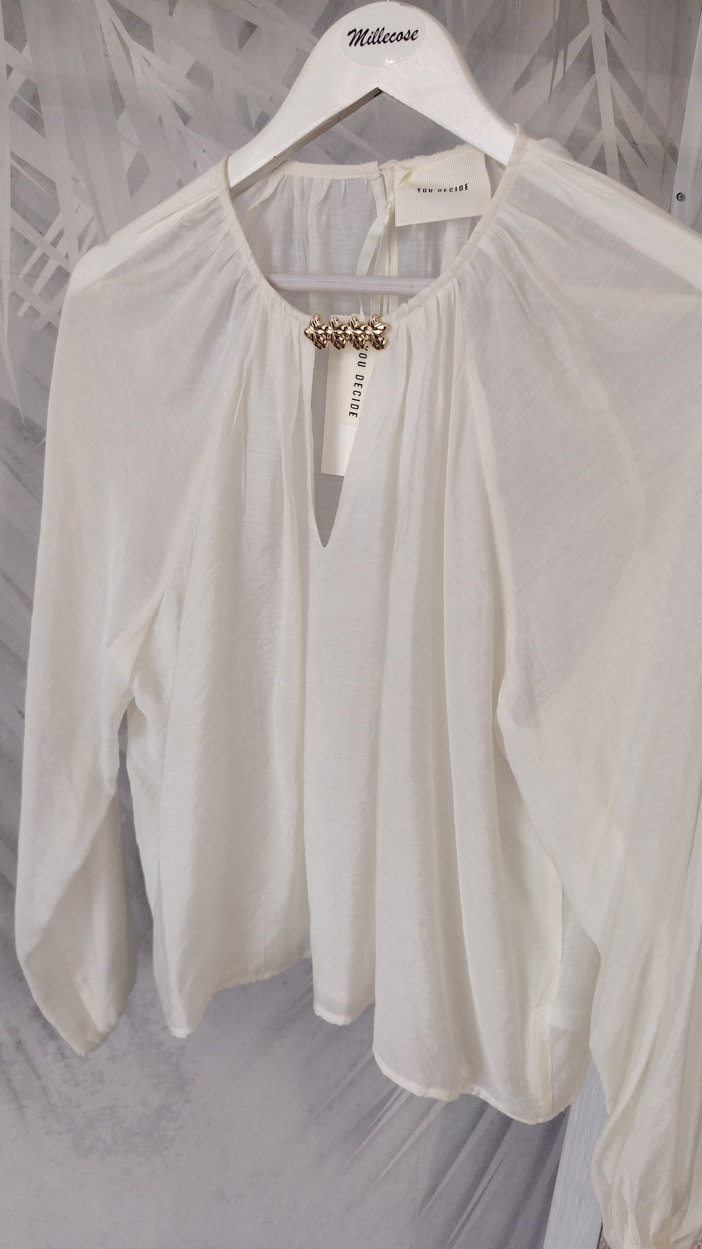 Blusa con dettaglio oro