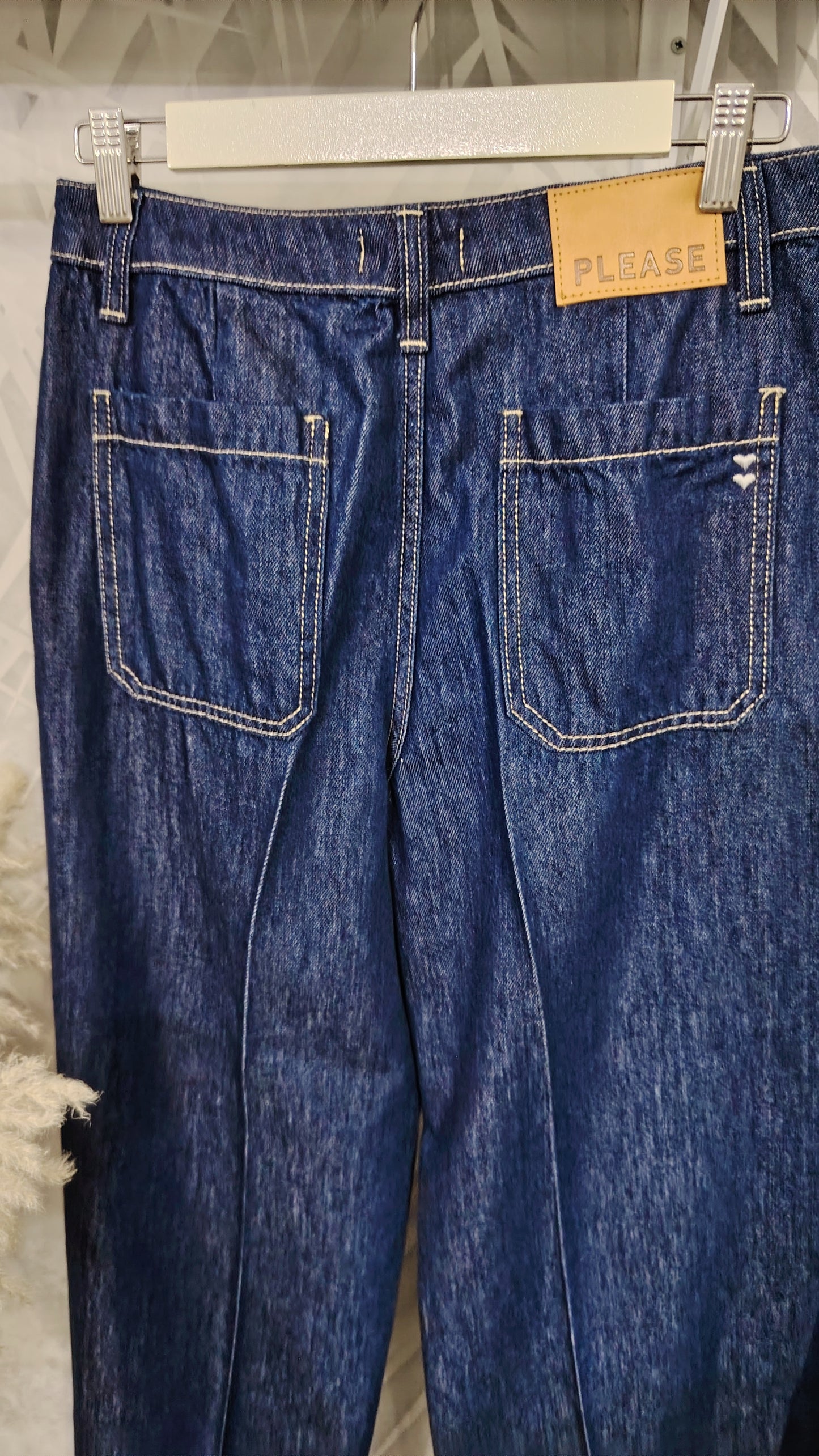 Jeans a gamba ampia con piega frontale